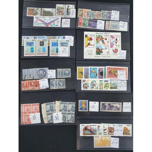 349 - Eight small dealer cards containing Vietnam (3 cards), Vanuatu (2 cards), Philippines (2 cards),  Ja... 