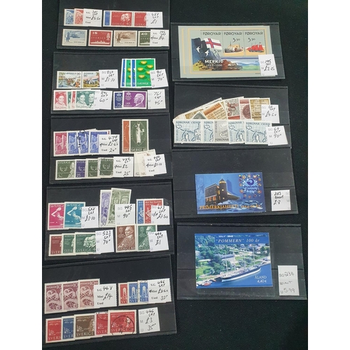 351 - Nine small dealer cards containing Sweden (5 cards), Faroe Islands (3 cards) and Aland (1 card) mint... 