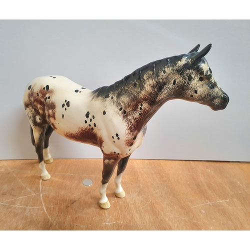 512 - Beswick Appaloosa Stallion, model no. 1772, designed by Arthur Gredington,

Approx 20cm high by 24cm... 