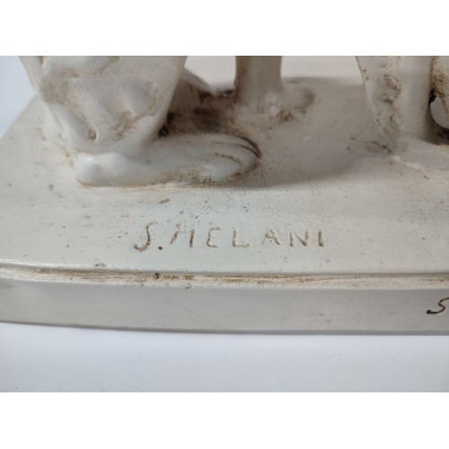 519 - After S. Melani, (1902-1934), art-deco figurative plaster sculpture depicting lady with dog

51cm hi... 