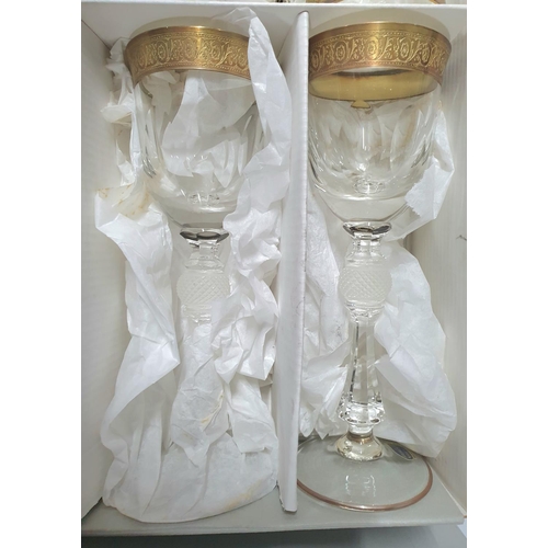 242 - Eight boxed Bohemia (Czech Republic) crystal glasses with gilt edging (8)