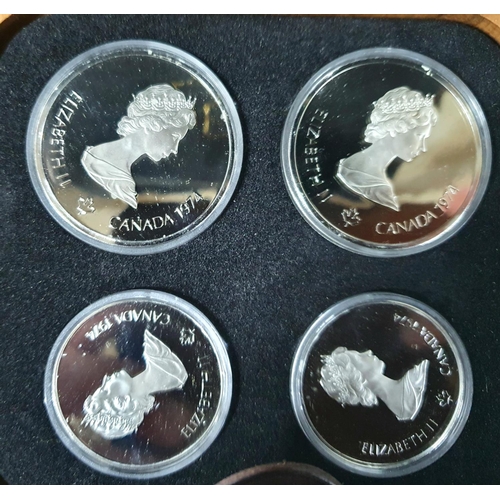 16 - Canada 1976 Olympics sterling silver proof four coin set, cased with certificate and outer box,

Cer... 