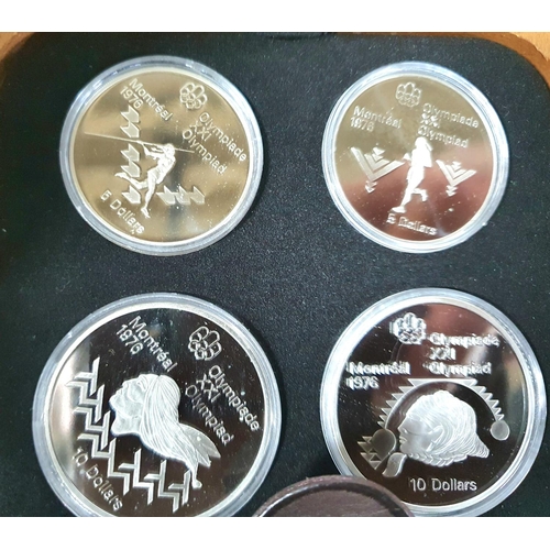 17 - Canada 1976 Olympics sterling silver proof four coin set, cased with certificate and outer box,

Cer... 