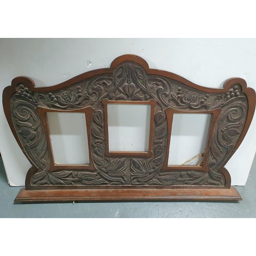 39 - Stunning hand-carved Oak, Art Nouveau period triple photo frame

The overall size is approx 46 x 75c... 