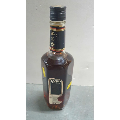 106 - Complete 1980s Lambs imported genuine Navy Rum 40% vol, 700ml