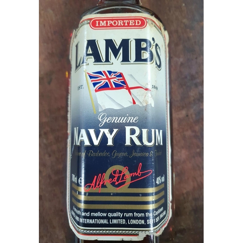 106 - Complete 1980s Lambs imported genuine Navy Rum 40% vol, 700ml