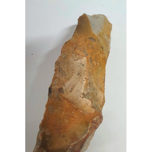 14 - Stone Age axe head with sharpened edge to one end and rounded end to the other,

17 cm long