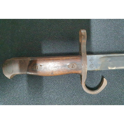 69 - Japanese WWII type 30 bayonet and metal scabbard possibly produced by Toyoda Automatic Loom Co