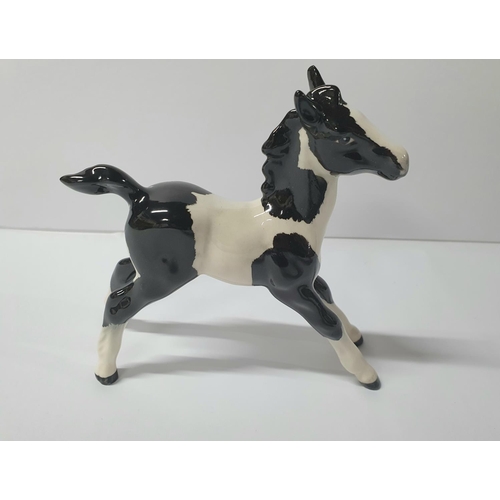 124 - RARE Beswick Pinto Piebald pony,

Approx 13cm long by 13cm tall

Please note - We cannot find this p... 