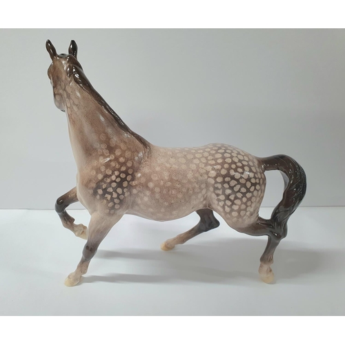 128 - Large rocking horse grey, prancing Arab horse, stamped Beswick

Approx 22cm long x 22cm high