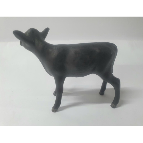 138 - Small mat black Aberdeen Angus calf, indistinctly stamped, probably Beswick