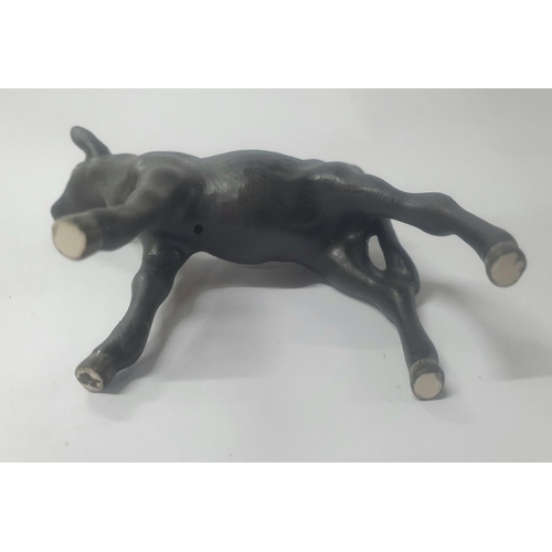 138 - Small mat black Aberdeen Angus calf, indistinctly stamped, probably Beswick