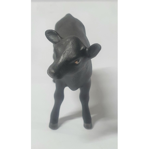 138 - Small mat black Aberdeen Angus calf, indistinctly stamped, probably Beswick