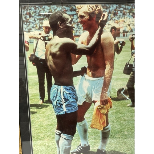 113 - Signed Pele picture with Bobby Moore after that knocked England out of the World cup in 1970s with C... 