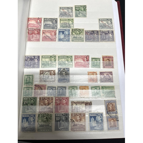 178 - Red stock book containing King George VI Commonwealth mint and used, sets and blocks, all unmounted ... 