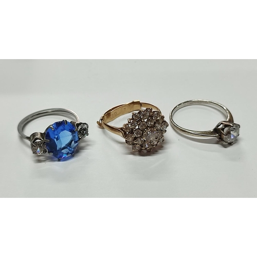 289 - A 9ct. yellow gold hallmarked cluster ring with CZ stones together with two costume examples (3)

3.... 