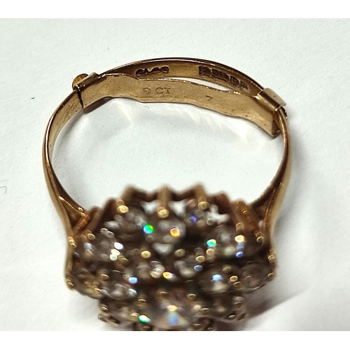 289 - A 9ct. yellow gold hallmarked cluster ring with CZ stones together with two costume examples (3)

3.... 