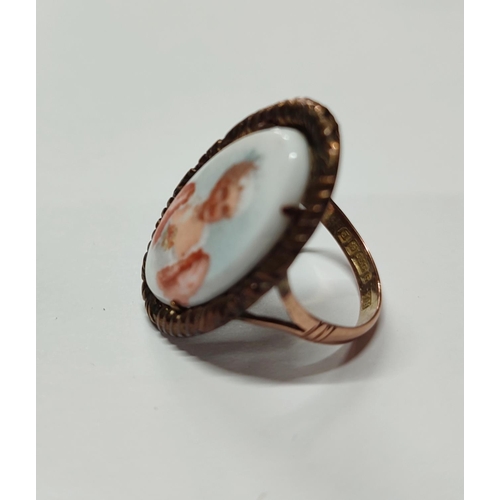 228 - A 9ct. rose gold ring with an oval ceramic female portrait insert

5.14 grams gross