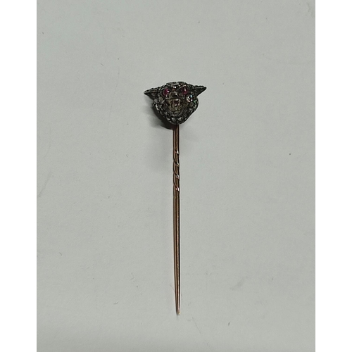 231 - A diamond and pink sapphire leopard head tie-pin

3.8 grams gross