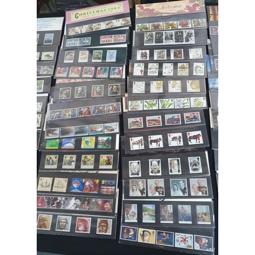 195 - Approx 110 GB QEII 1980s and 1990s stamp packs, high overall value (approx 110)