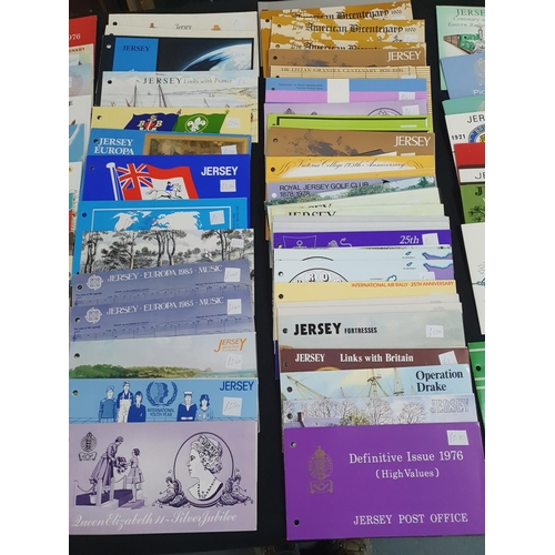 197 - Large collection of Jersey 1970s-2006 stamp packs, approx 130 together with 2 Guernsey examples (130... 