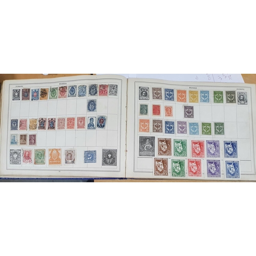 201 - Old blue Improved stamp album depicting a large quantity of early stamps from all continents especia... 