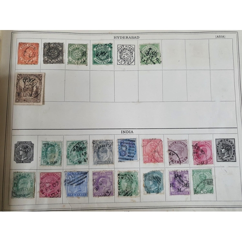 201 - Old blue Improved stamp album depicting a large quantity of early stamps from all continents especia... 