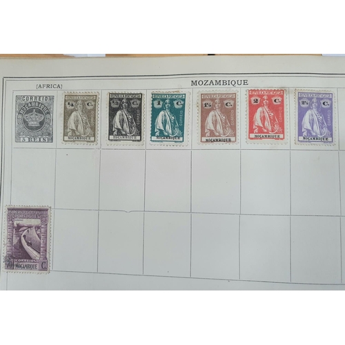 201 - Old blue Improved stamp album depicting a large quantity of early stamps from all continents especia... 