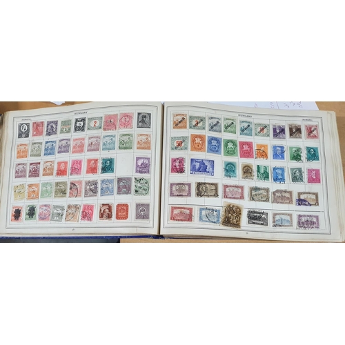 201 - Old blue Improved stamp album depicting a large quantity of early stamps from all continents especia... 