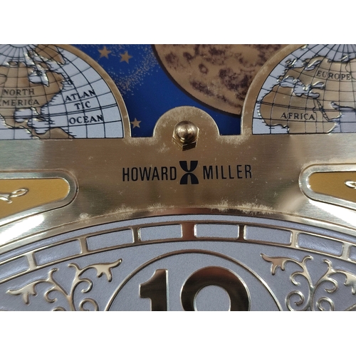 103 - Howard Miller, longcase Grandfather clock with three weights and pendulum