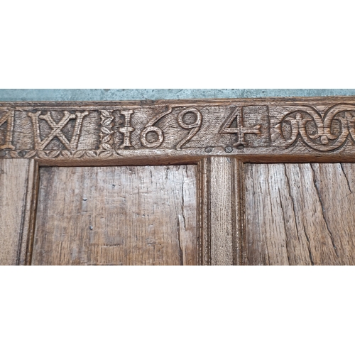 215 - Antique Oak panel C.1694, hand-carved

122 x 58 cm