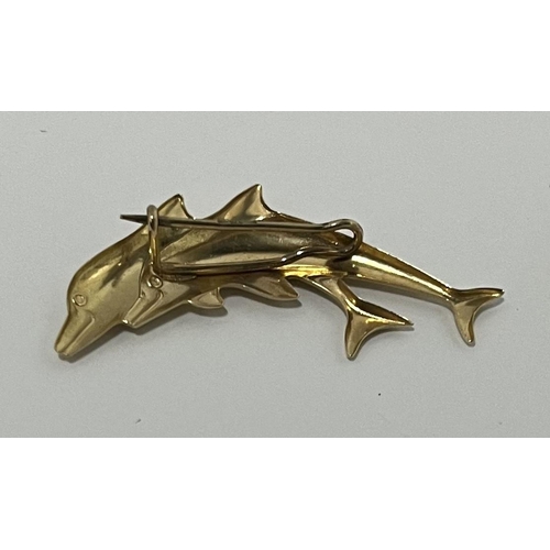 297 - 9ct Gold Dolphin brooch