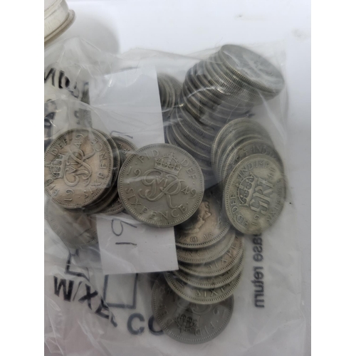 346 - Large quantity of QEII Two shillings coins and Sixpences in a long metal tub (Qty),

Most in VF or u... 