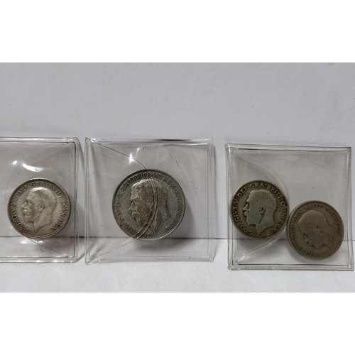 356 - Quantity of George V silver one shilling coins together with 2 half crowns (Qty),

177 grams