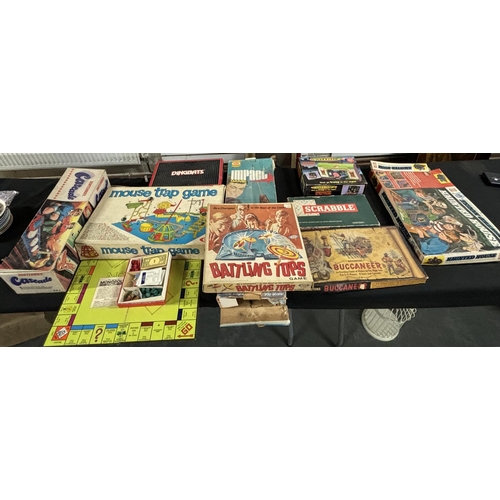 402 - Collection of old games, Haunted house, Battling tops and Possibly one of the first monoploy boards ... 