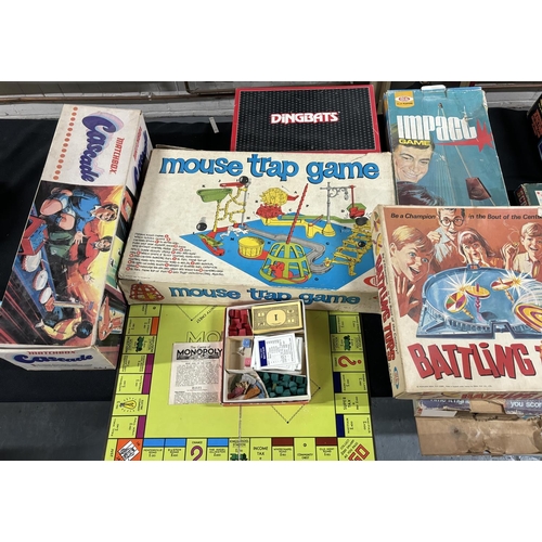 402 - Collection of old games, Haunted house, Battling tops and Possibly one of the first monoploy boards ... 