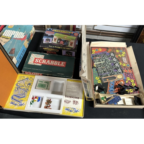 402 - Collection of old games, Haunted house, Battling tops and Possibly one of the first monoploy boards ... 