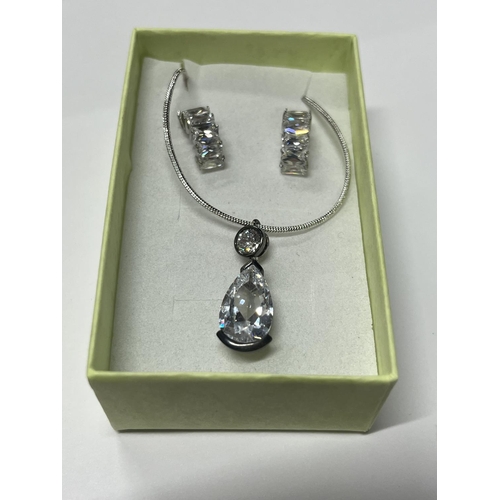 276 - Silver flower pendant on chain with earings along with silver crystal bird nest pendant on chain and... 