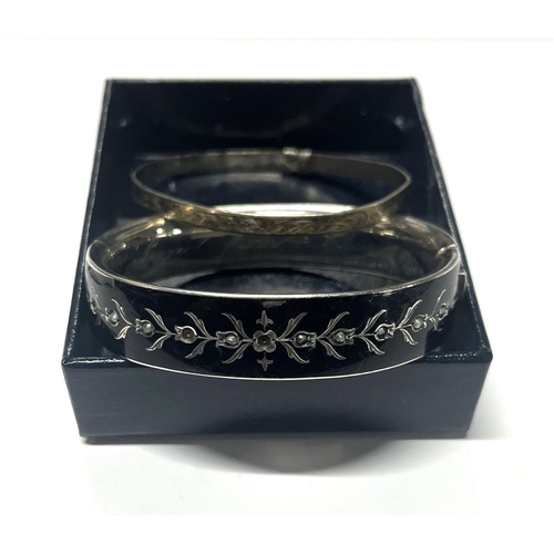 279 - 2 hallmarked silver bangles along with silver 3 strand necklace and bracelet