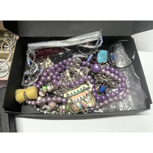 281 - 2 boxes of various costume jewellery (2)