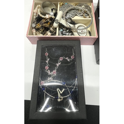 281 - 2 boxes of various costume jewellery (2)