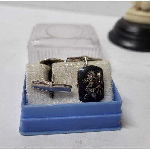 435 - various collectables including Two lighters, Two Resin figures and cufflinks (Qty)