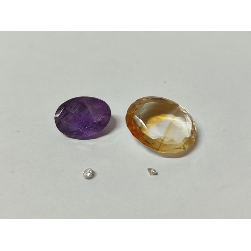 298 - Two tiny Diamonds, an Amethyst and an Aquamarine stone (4)