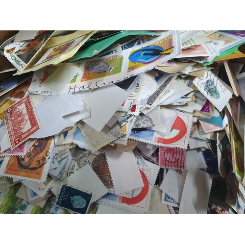 516 - Huge box full of unsorted loose stamps - approx 2.5 kilos