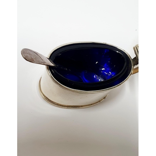 251 - 1909 London Silver sugar pot complete with blue glass liner,

The silver weighs 74 grams