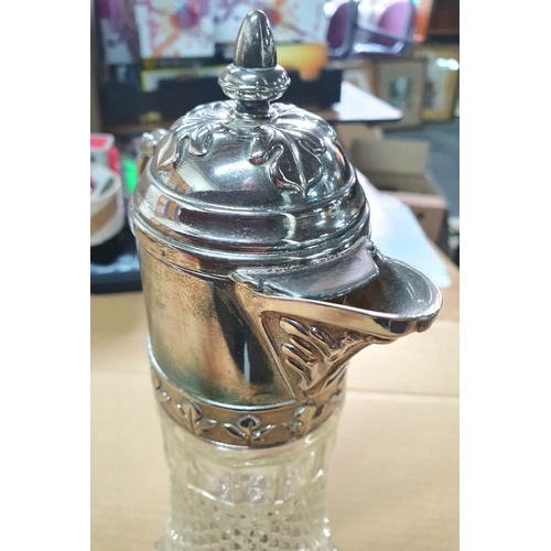 536 - Cut glass and silver plate claret jug