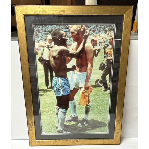 113 - Signed Pele picture with Bobby Moore after that knocked England out of the World cup in 1970s with C... 