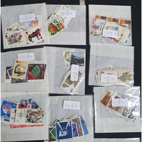 194 - Ten bags containing mint unmount QEII post decimal stamps, each bag containing around £10 in face va... 