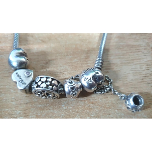 22 - Pandora bracelet with some charms