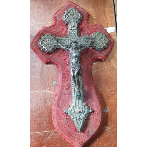 38 - Ornate antique, finely cast metal on plaque of Jesus on the cross on red ornate background, probably... 